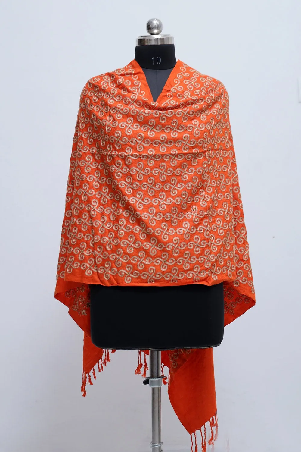 Bright Red Colour Wrap With All Over jaal And Touch Of Swarovski A Sure to Give You Warm Look.
