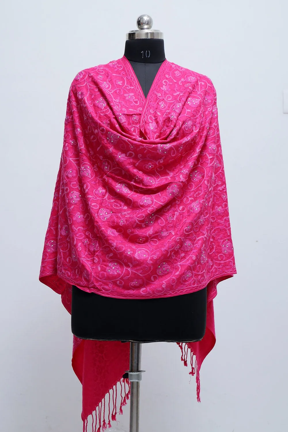 Carrot Colour Wrap With All Over jaal And Touch Of Swarovski A Sure to Give You Warm Look.