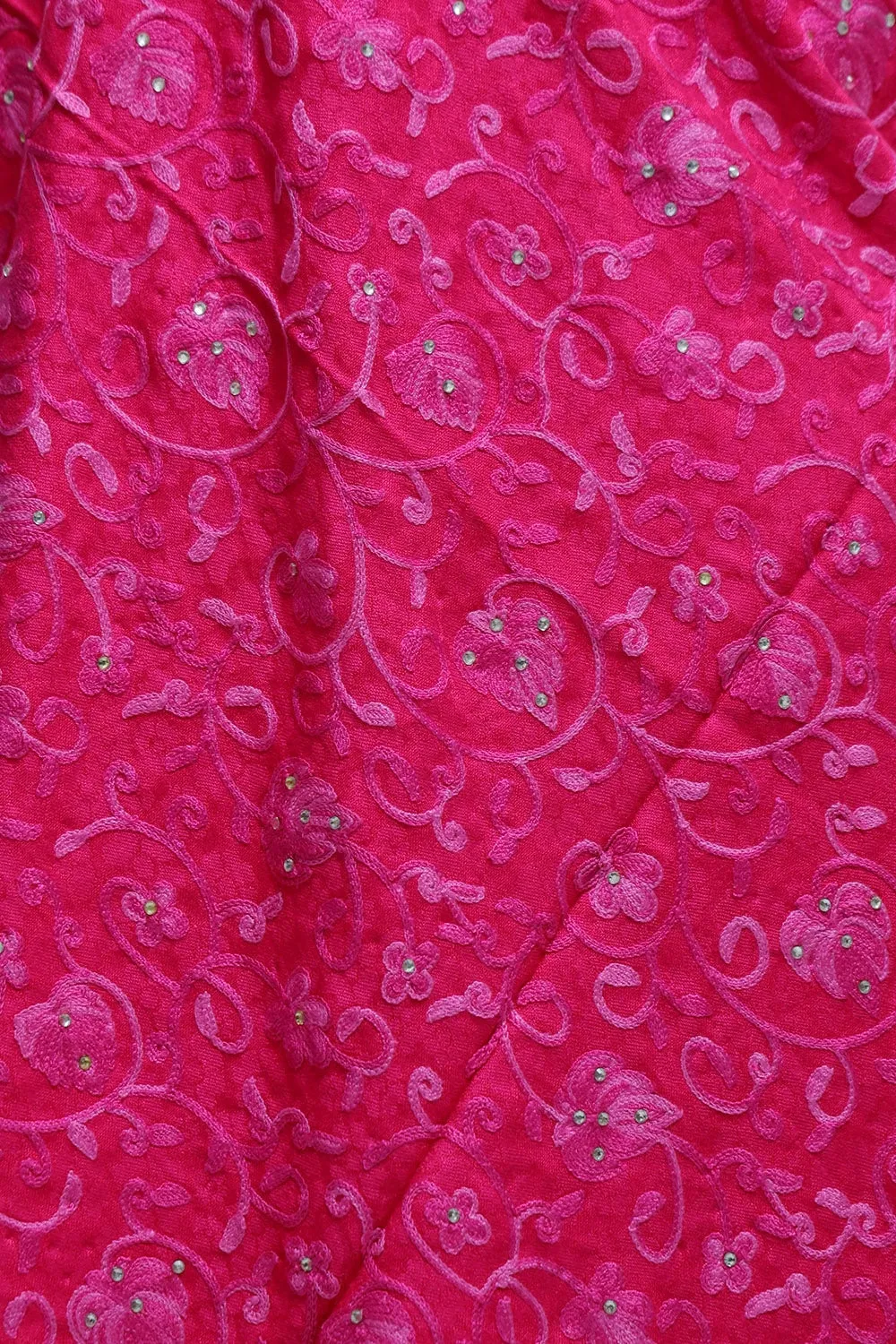 Carrot Colour Wrap With All Over jaal And Touch Of Swarovski A Sure to Give You Warm Look.